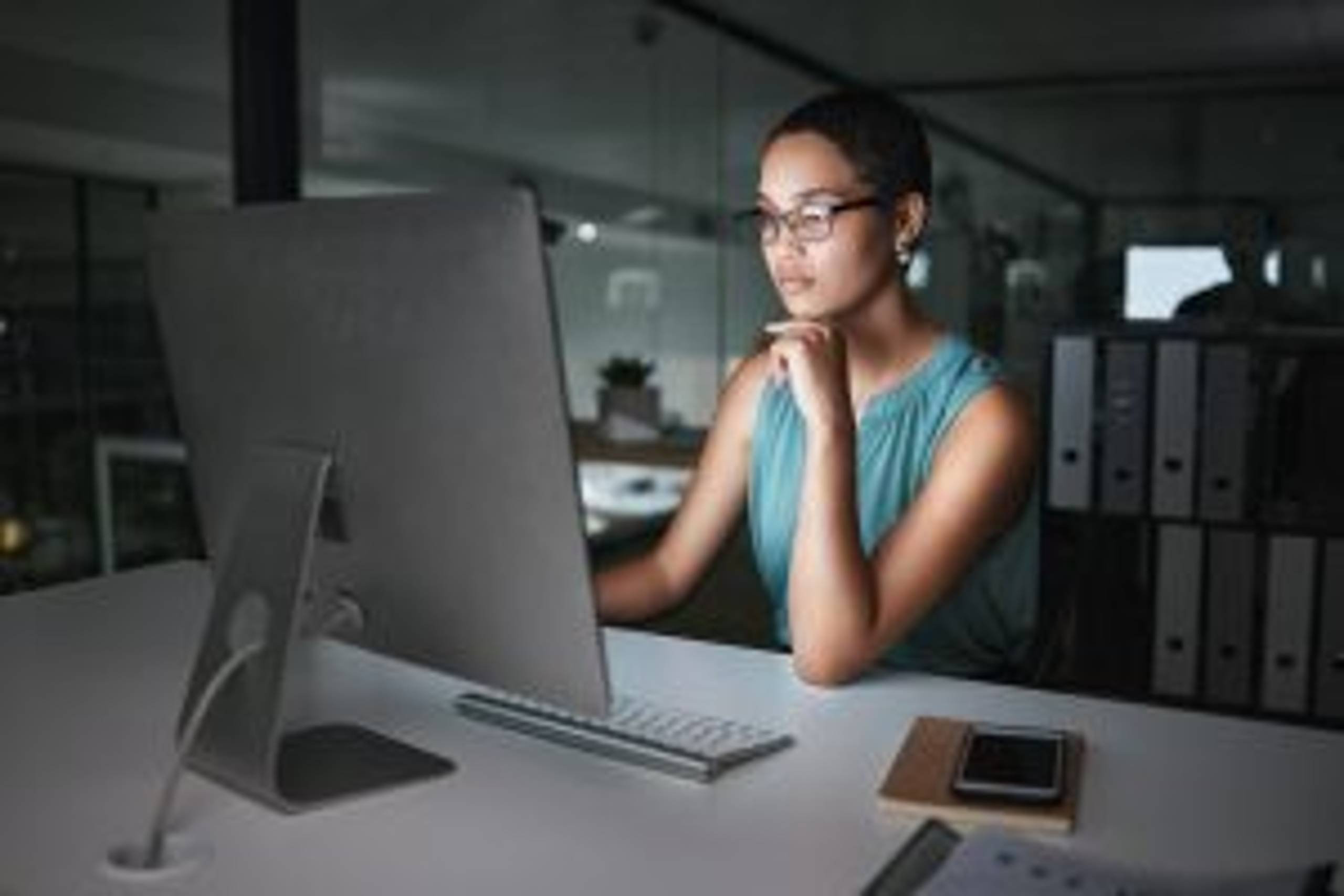 Computer, thinking and night woman reading finance portfolio, stock market database or review ecommerce feedback. Forex investment idea, data analysis or African trader trading NFT, bitcoin or crypto